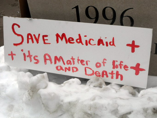 Rally sign to save Medicaid. It's a matter of life and death. 