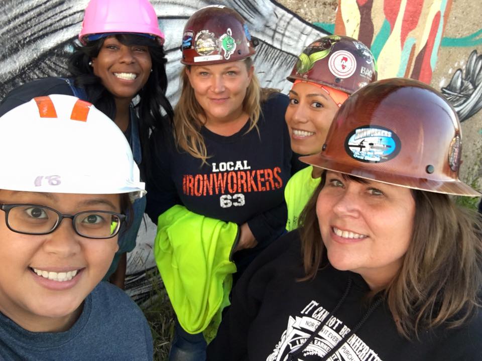 Women in store hard hats