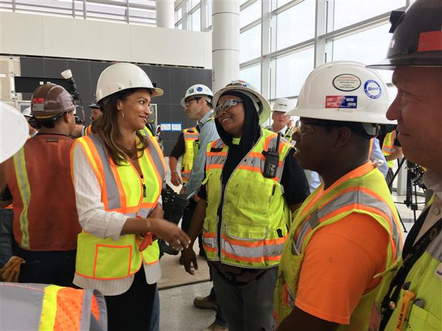 Women in cheap hard hats