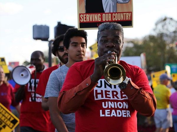 Service Trades Council workers rally for higher wages.