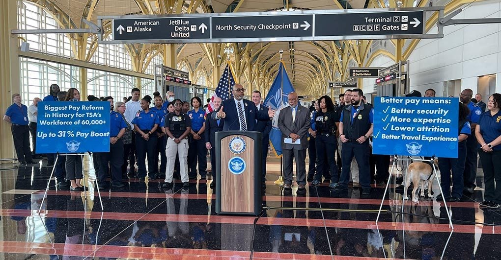TSA workers celebrate record pay increase.