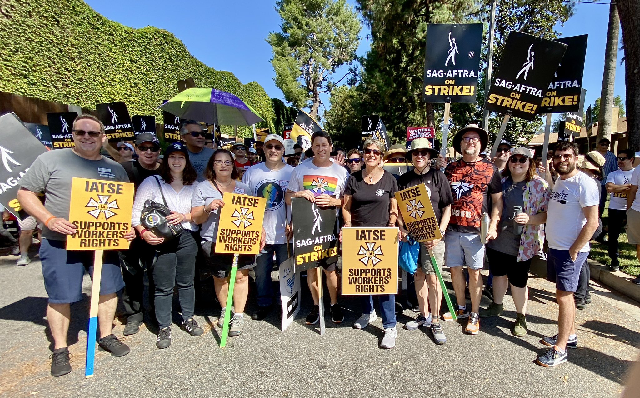 Editors Guild members show solidarity with striking writers, who are members of the Writers Guild of America West (WGAW), and actors, members of SAG-AFTRA