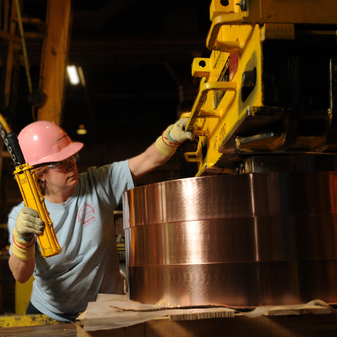 Woman working in a steel mill