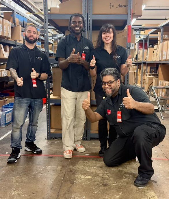 Workers at the Guitar Center New York flagship store celebrate their new contract.