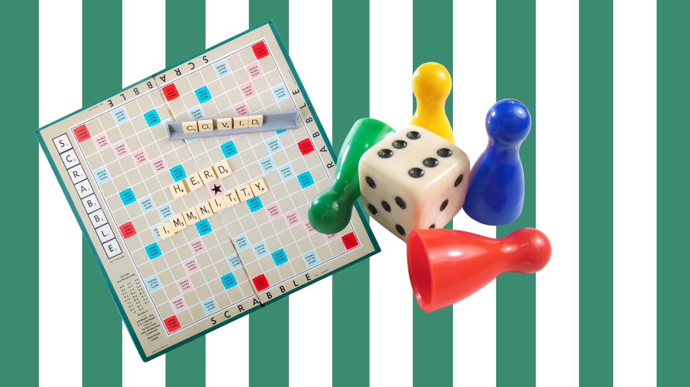 Game board and pieces on green striped background