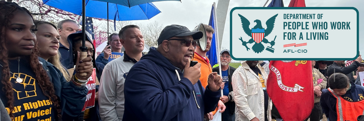 A banner with workers at a protest with a “Department of People Who Work for a Living” logo