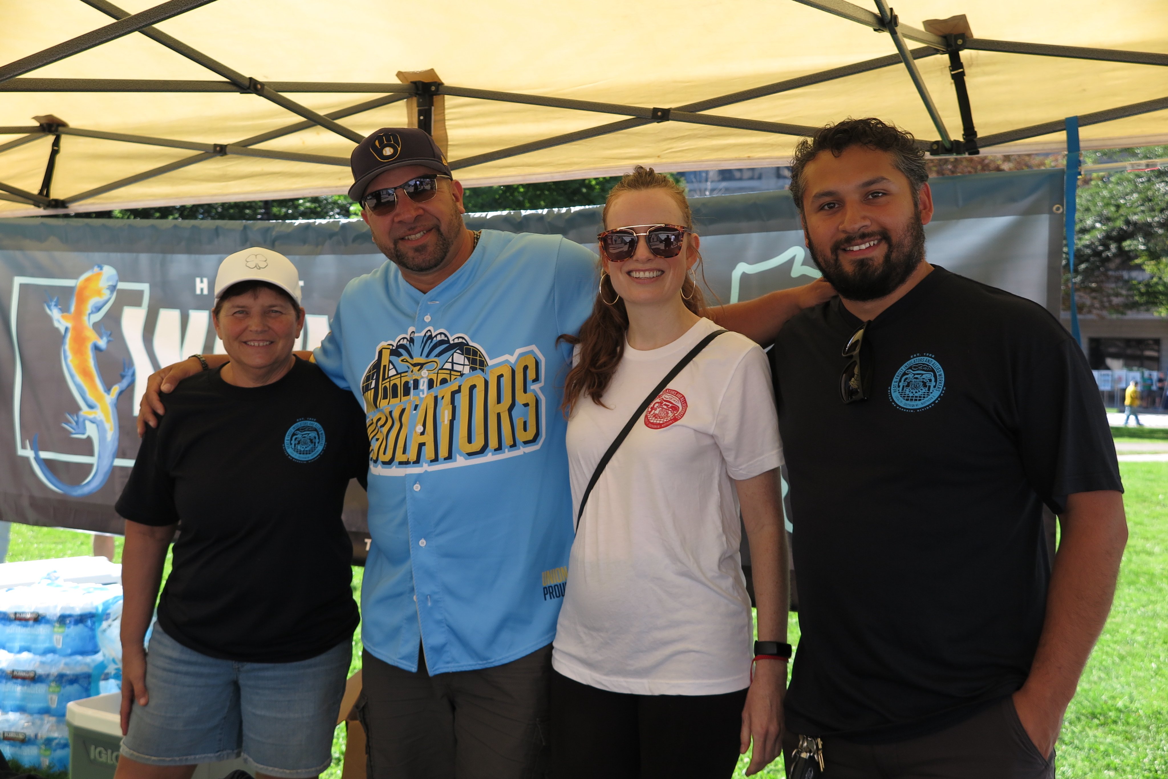Stephanie Bloomingdale (2nd from right) poses with workers on Labor Day.