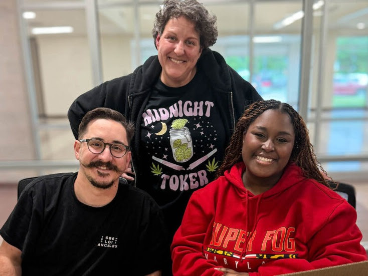 UFCW members smile and pose for a picture.